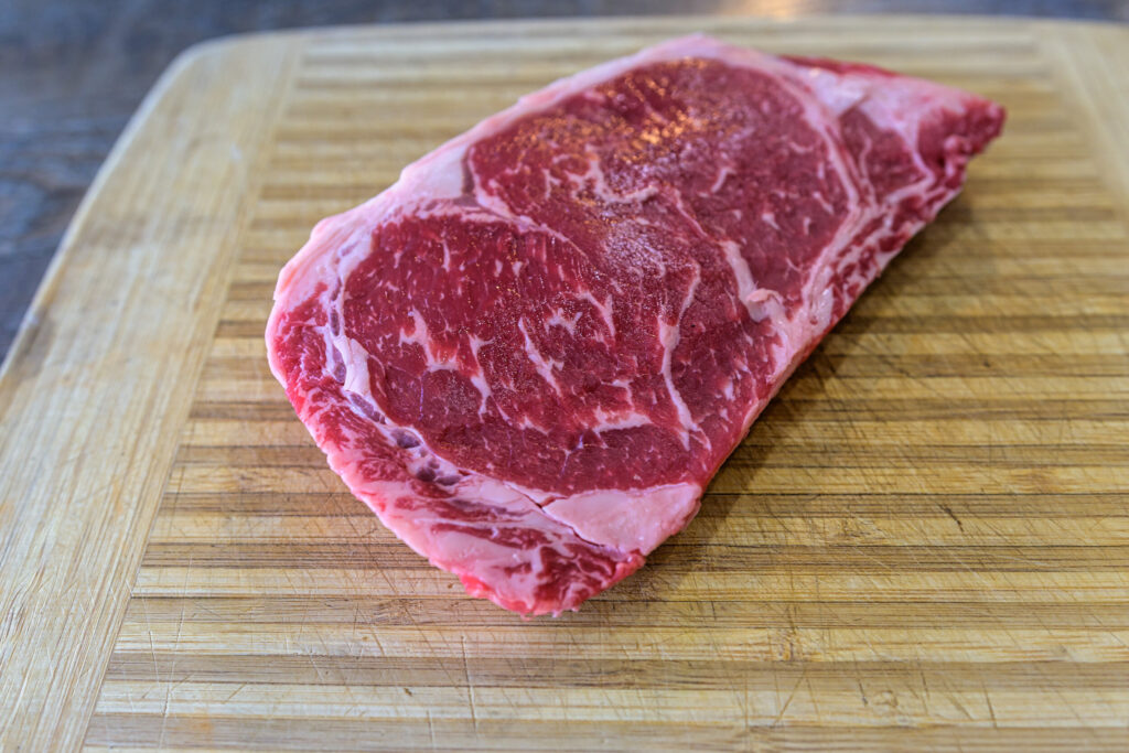 Starting with thick and well-marbled slab of Montana ribeye