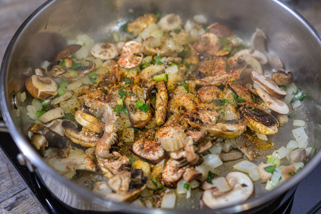 The onions and mushrooms in the skillet