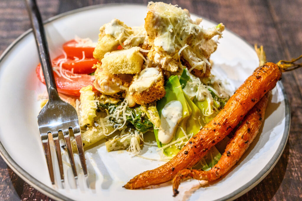 Greek Caeser Salad with souvlaki chicken and goat cheese croutons