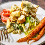 Greek Caeser Salad with souvlaki chicken and goat cheese croutons
